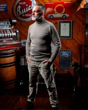 Bary cashmere turtleneck in light taupe - side detail view showing Italian craftsmanship